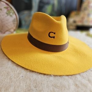 Elegant Yellow Wide-Brim Hat with Brown Band